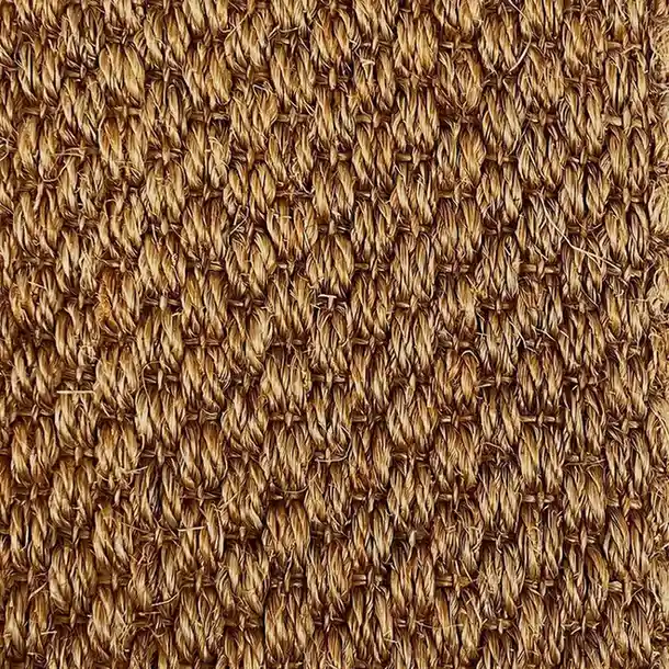 Babylon Autumn – Close-up of warm brown chunky woven sisal carpet