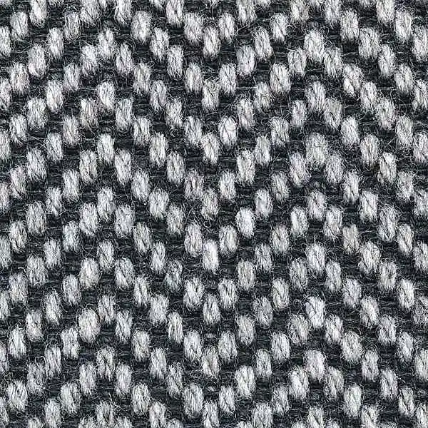 Black and white herringbone luxury wool carpet close-up