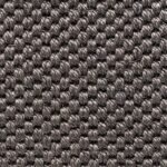 Close-up of a dark charcoal grey textured rug weave.