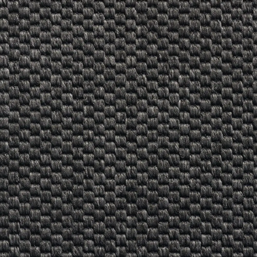 Close-up of dark charcoal woven carpet texture