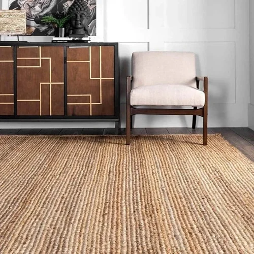 Stylish-living-room-with-a-natural-jute-rug-mid-century-armchair-and-geometric-wooden